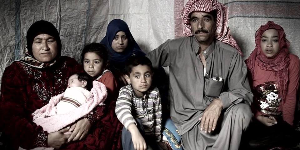 Syrische Familie in einem Flüchtlingslager in der Bekaa Ebene im Libanon