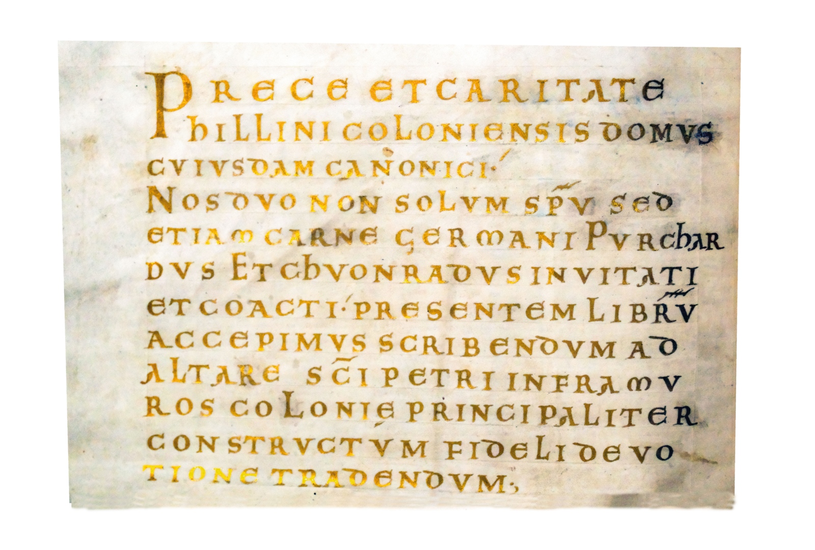Der Schreiber und der Buchmaler, Chuonradus und Purchardus, haben sich nicht nur mit ihrem Namen, sondern auch mit Angaben zu ihrer Person auf einer Seite des Codex in goldenen Lettern verewigt.